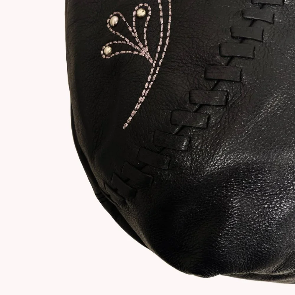 Fiore by Isabella Fiore Black Leather Studded Floral Hobo Bag Whipstitch Tassel